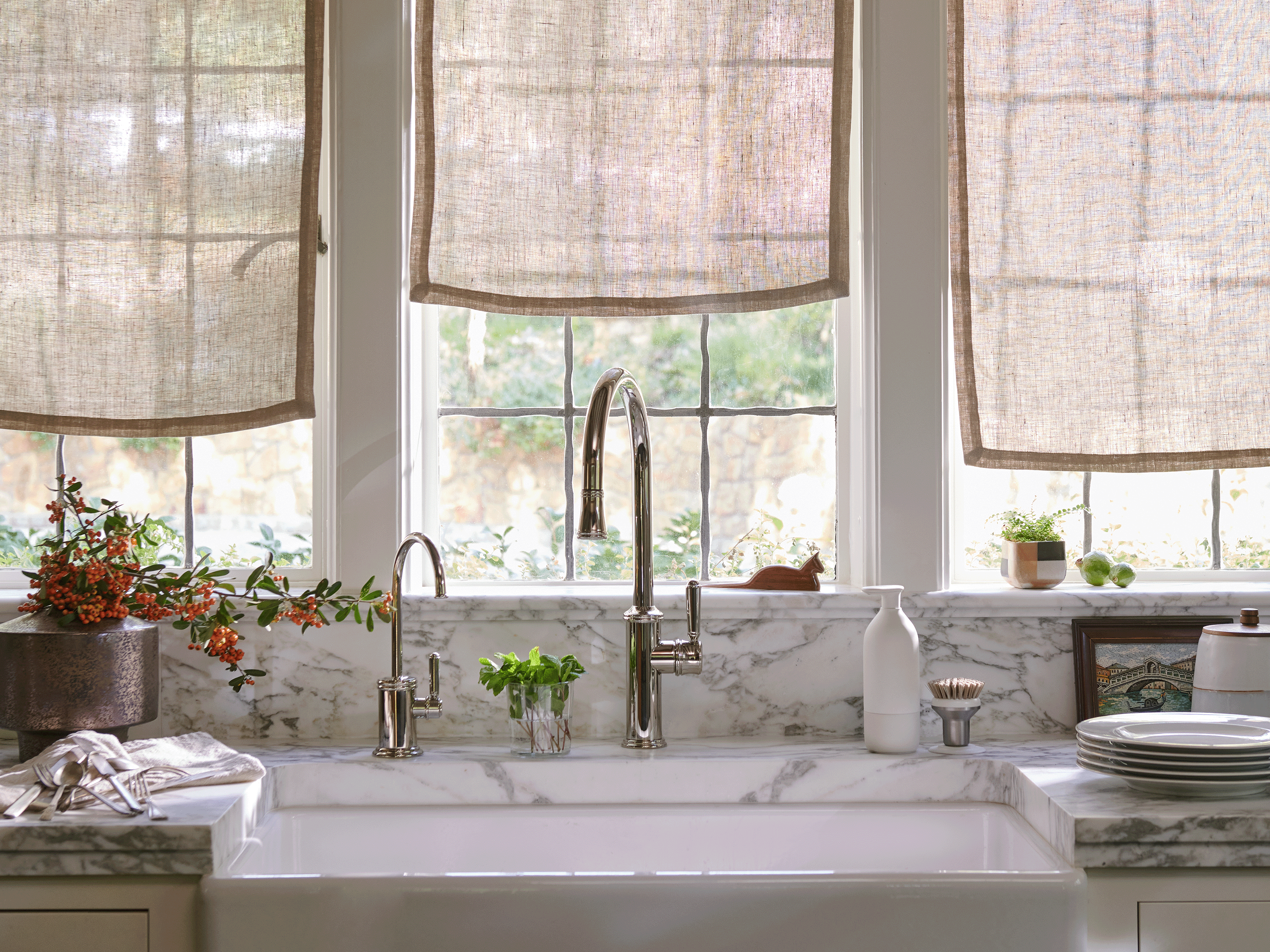 Modern kitchen sink with Curio Homegoods Ionic Palm Brush on counter