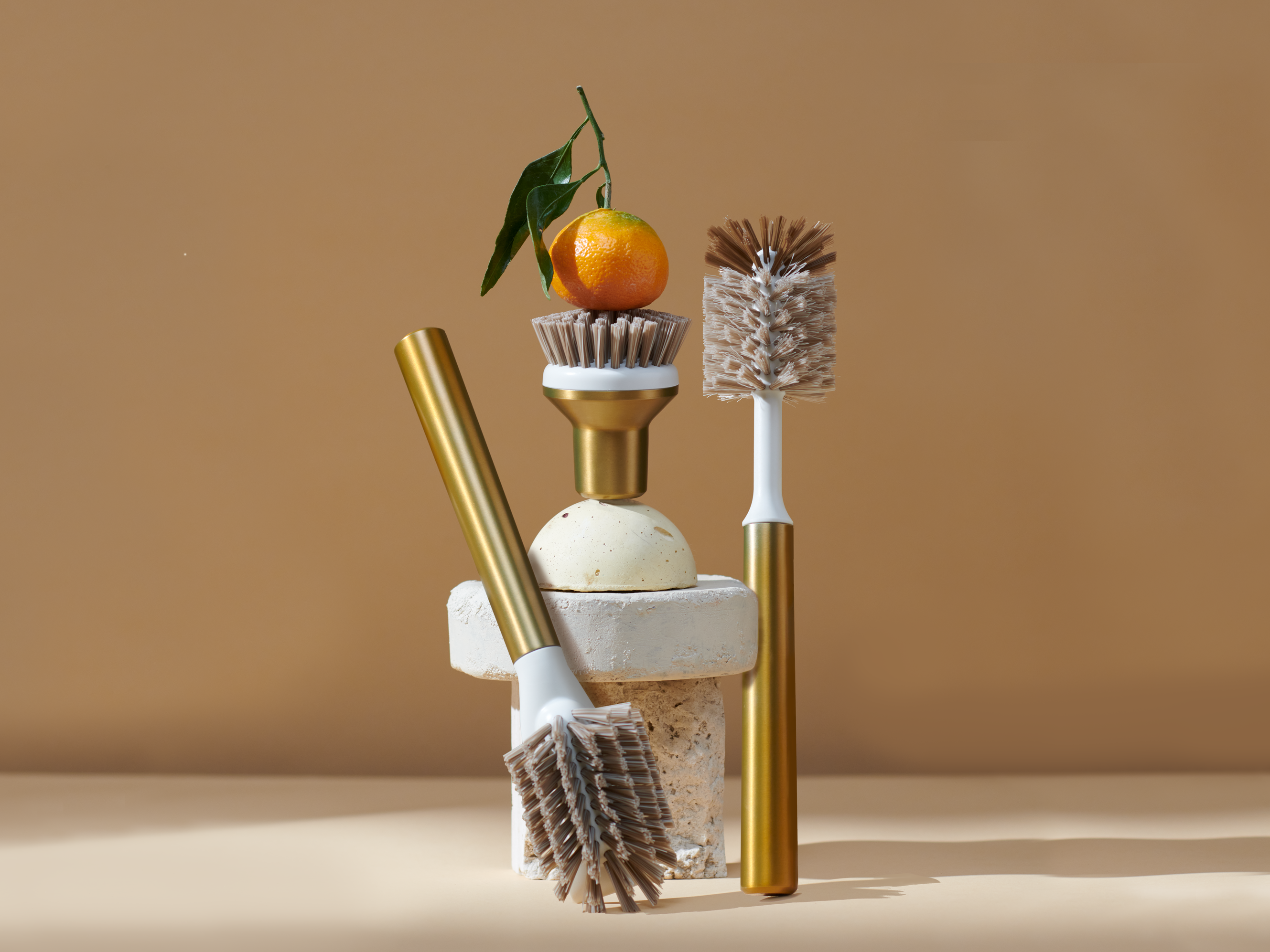 Curio Homegoods Ionic Brush Set with brown background and rocks