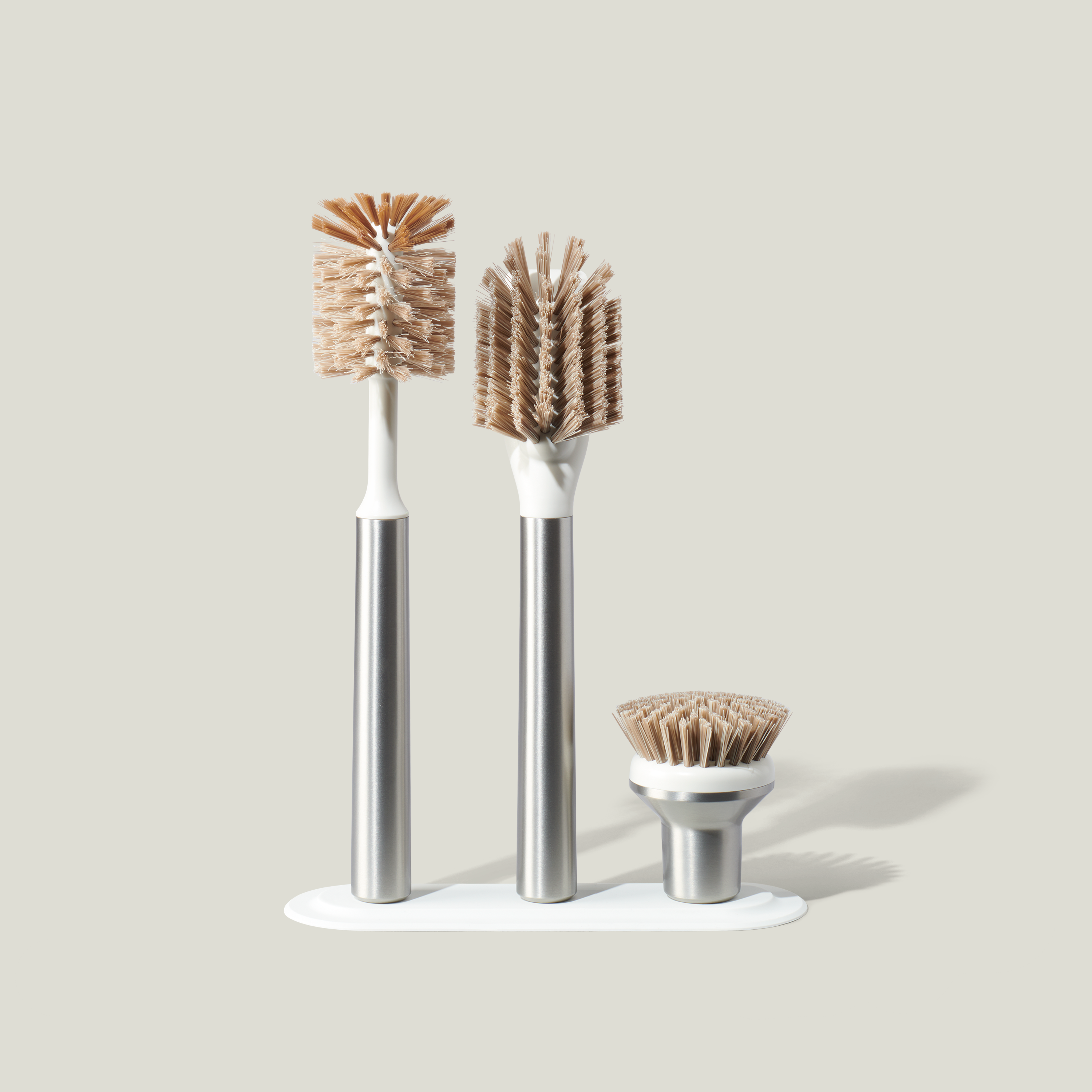 https://curiohomegoods.com/cdn/shop/files/1022_the_ionic_brush_set_steel_1_reworked.png?v=1682527149