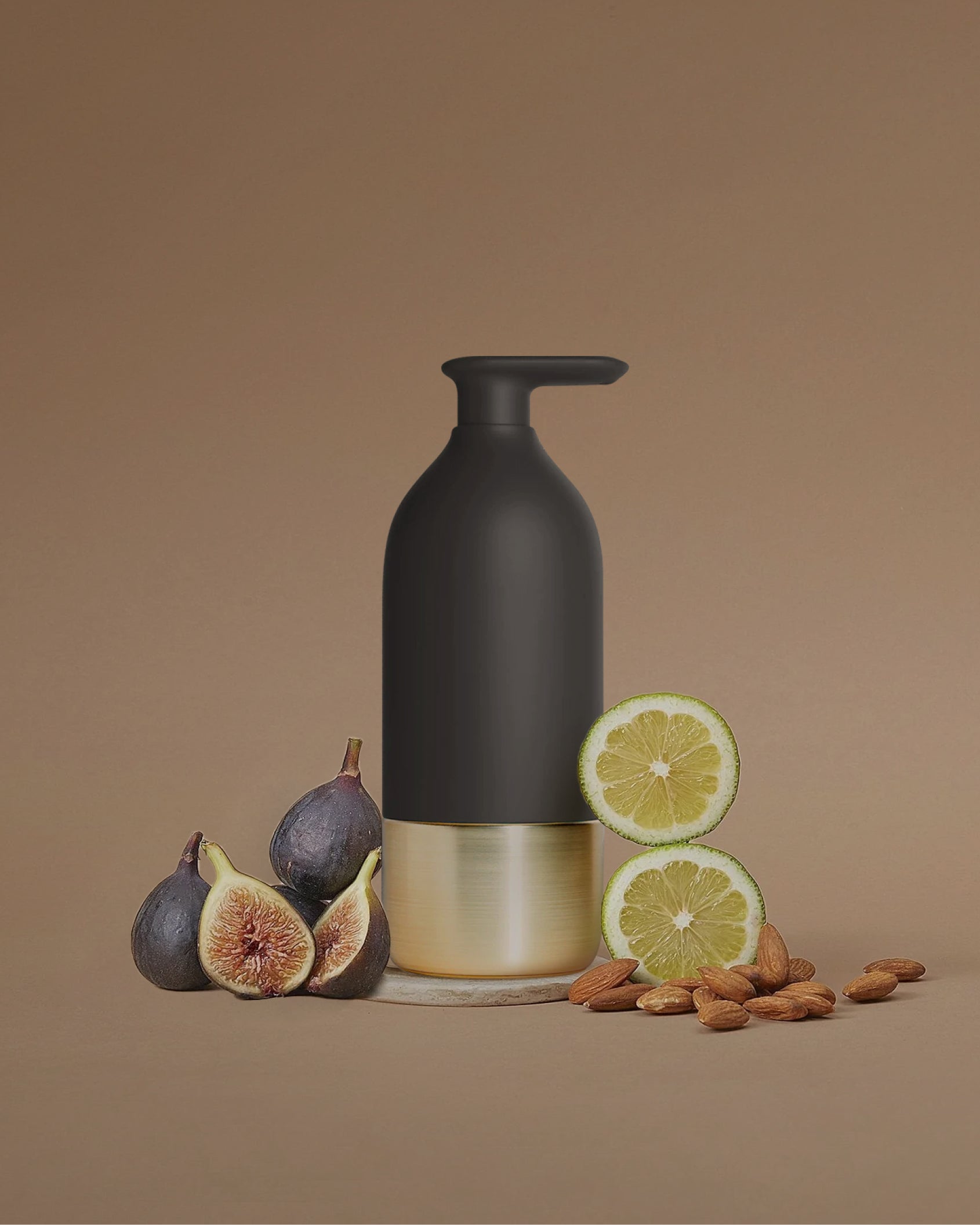 Curio Homegoods soap dispenser among fruits and nuts